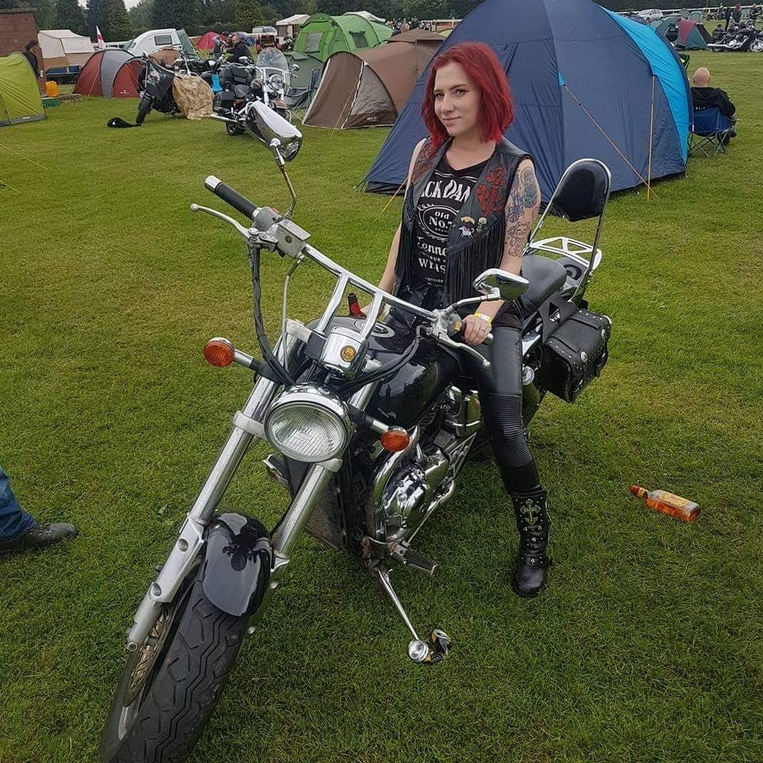 Charlotte Attle sitting on a bike