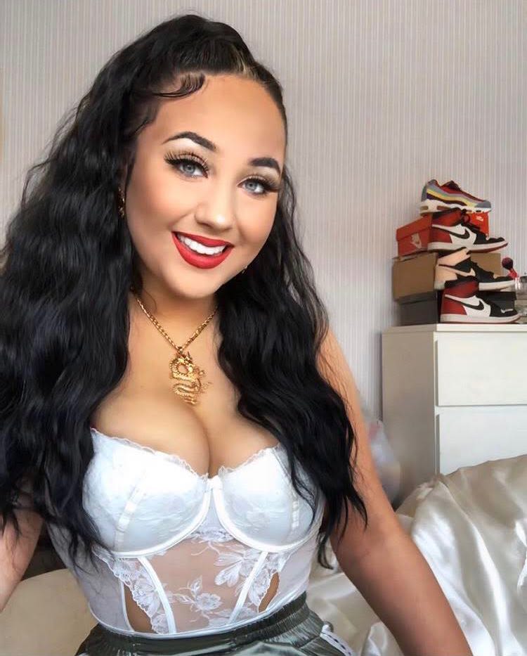 Daria Tyminska in a white bodysuit